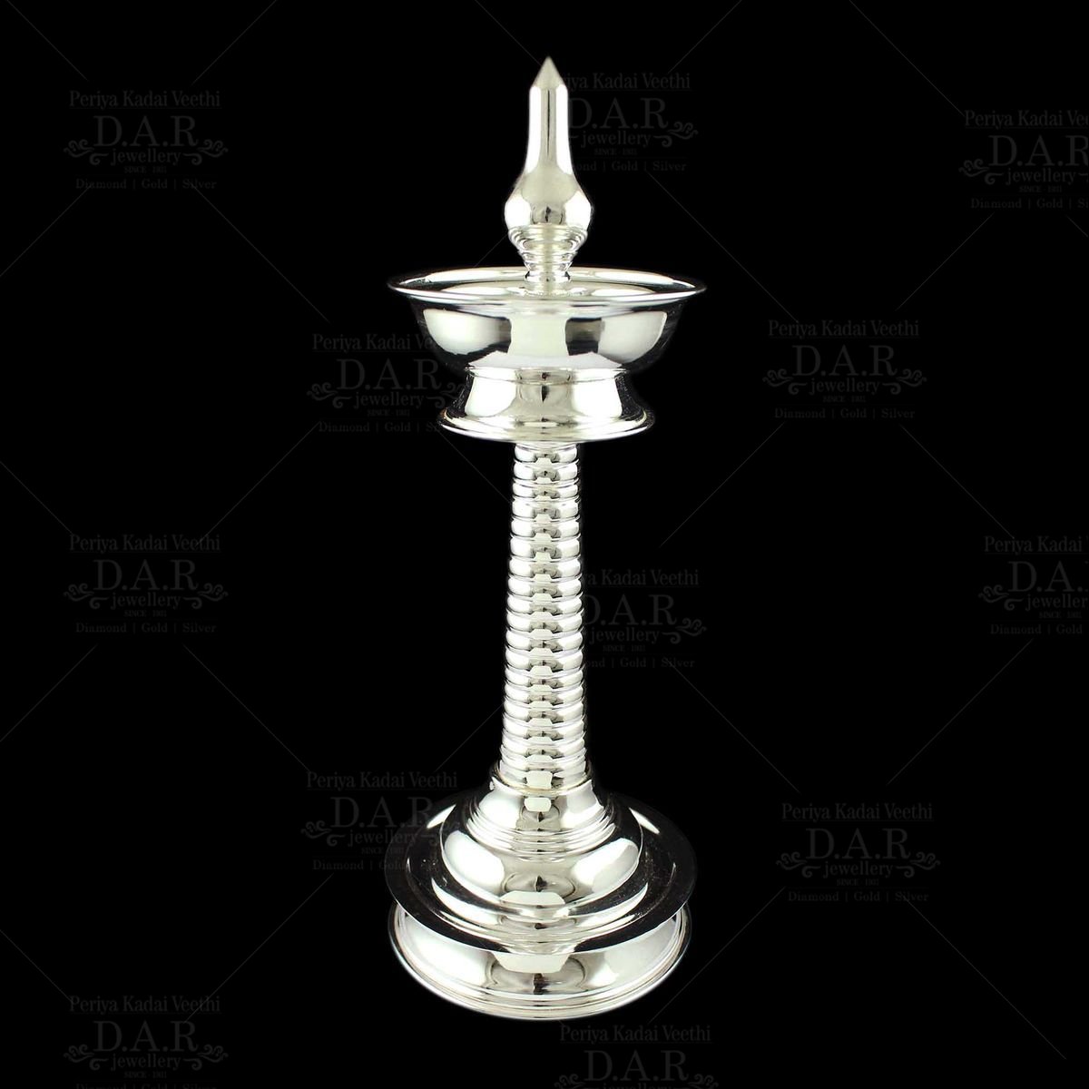 Illuminate Traditions with DAR Jewellery s Silver Kuthu Vilakku Silver Lamps www.darjewellery